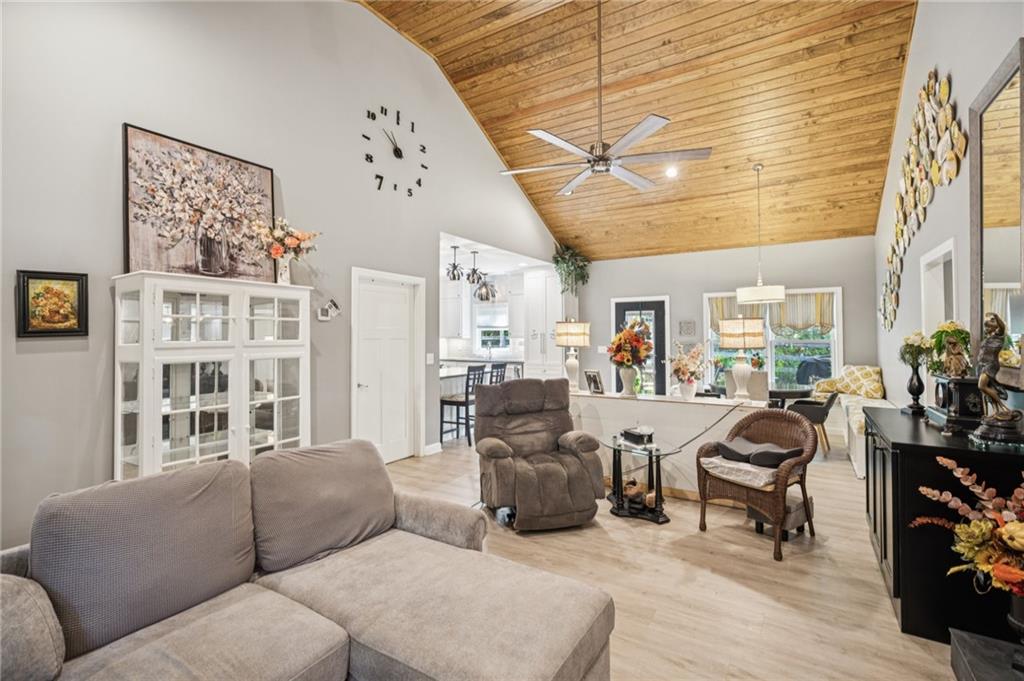 305 Wilkie Road Ball Ground, GA 30107 - Photo 11 of 37 a living room with furniture