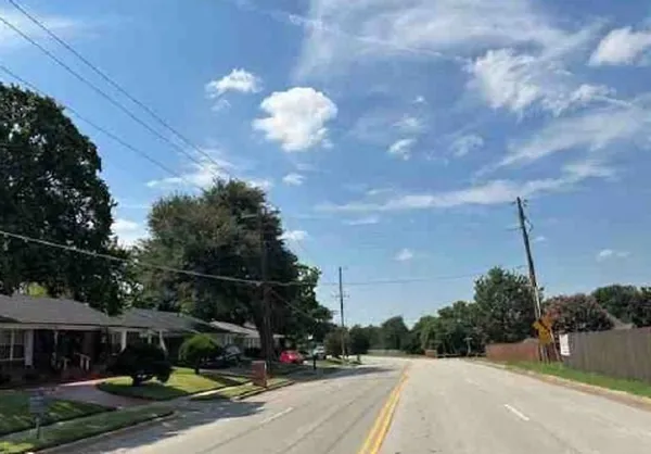 a view of street with houses