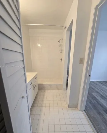 a tree in the middle of a yard