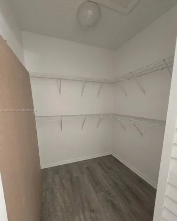 a front view of a building with garden