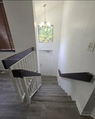 a view of a yard with palm tree