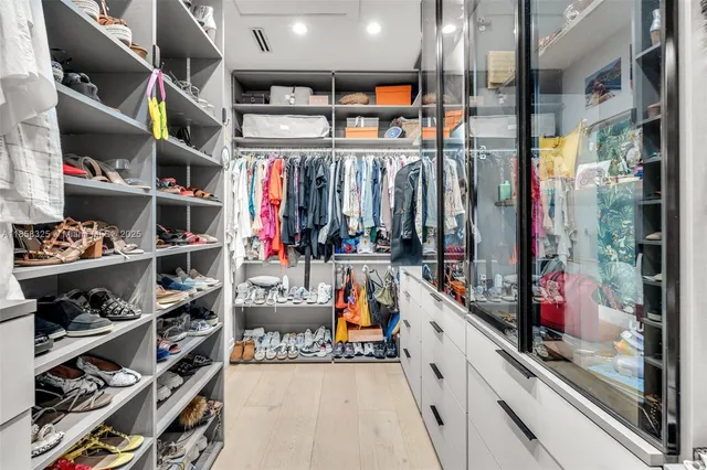 a bedroom with a bed and a table in it