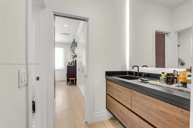 a bedroom with a bed and a closet