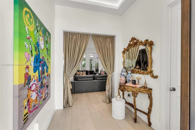 a spacious bedroom with a large bed and a window