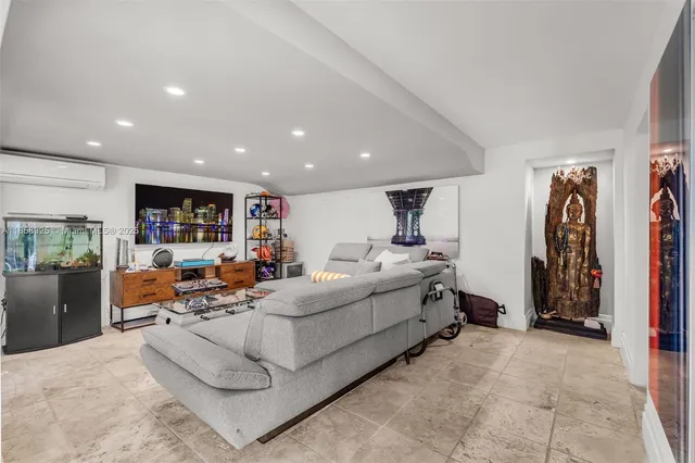 a view of a patio with table and chairs and potted plants