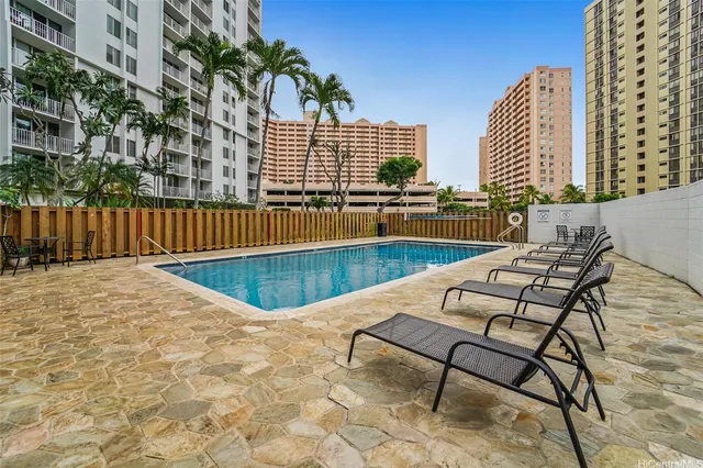 a view of a city with tall buildings