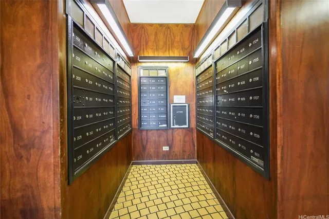 a living room with furniture a flat screen tv and a large window