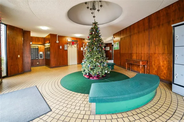a view of a cars park in front of a building