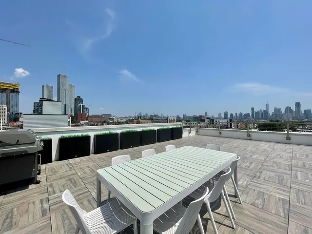 a view of dinning table and chairs in the terrace