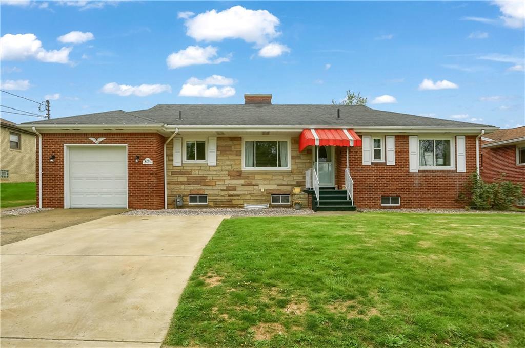 a front view of house with yard