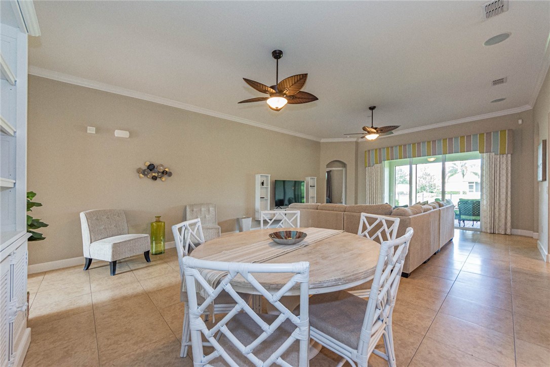 4250 Diamond Square Vero Beach, FL 32967 - Photo 16 of 33 a view of a dining room with furniture