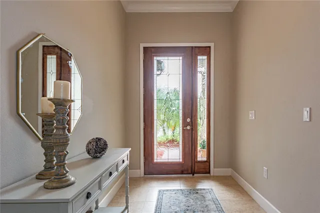 a view of hall way with furniture