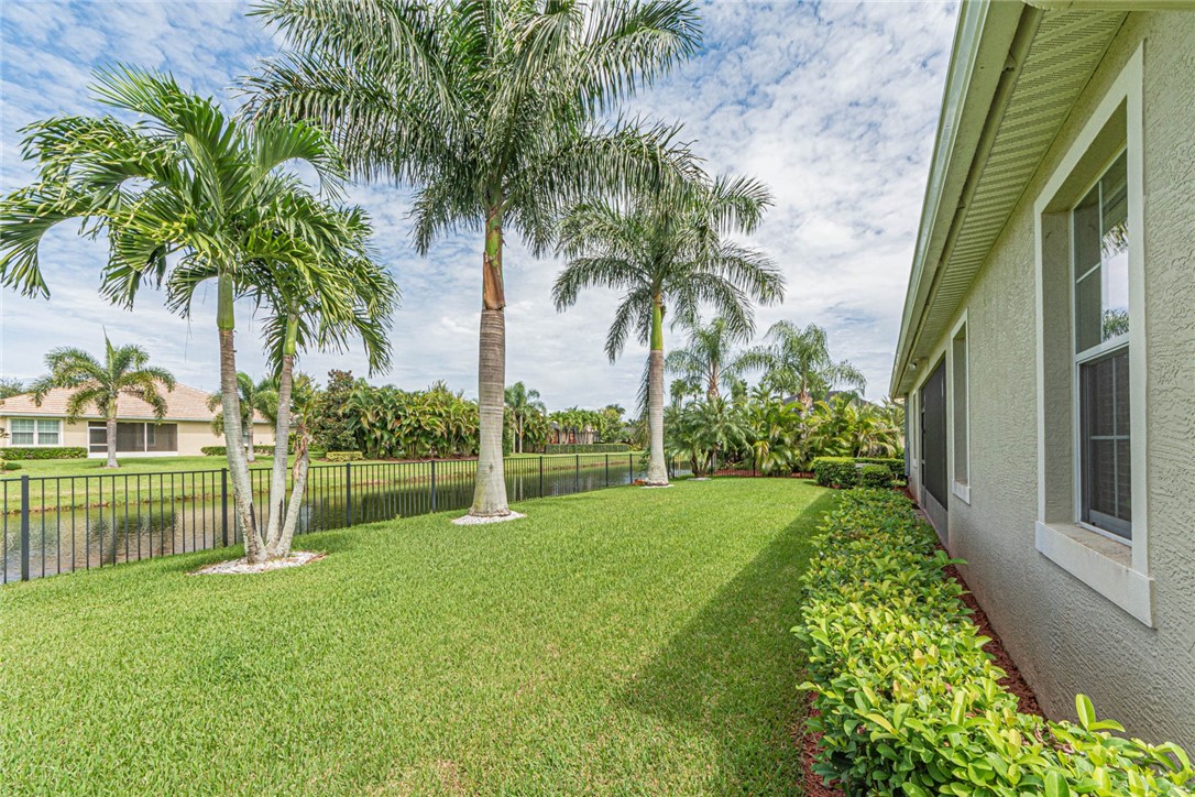 4250 Diamond Square Vero Beach, FL 32967 - Photo 29 of 33 a view of a backyard with a garden