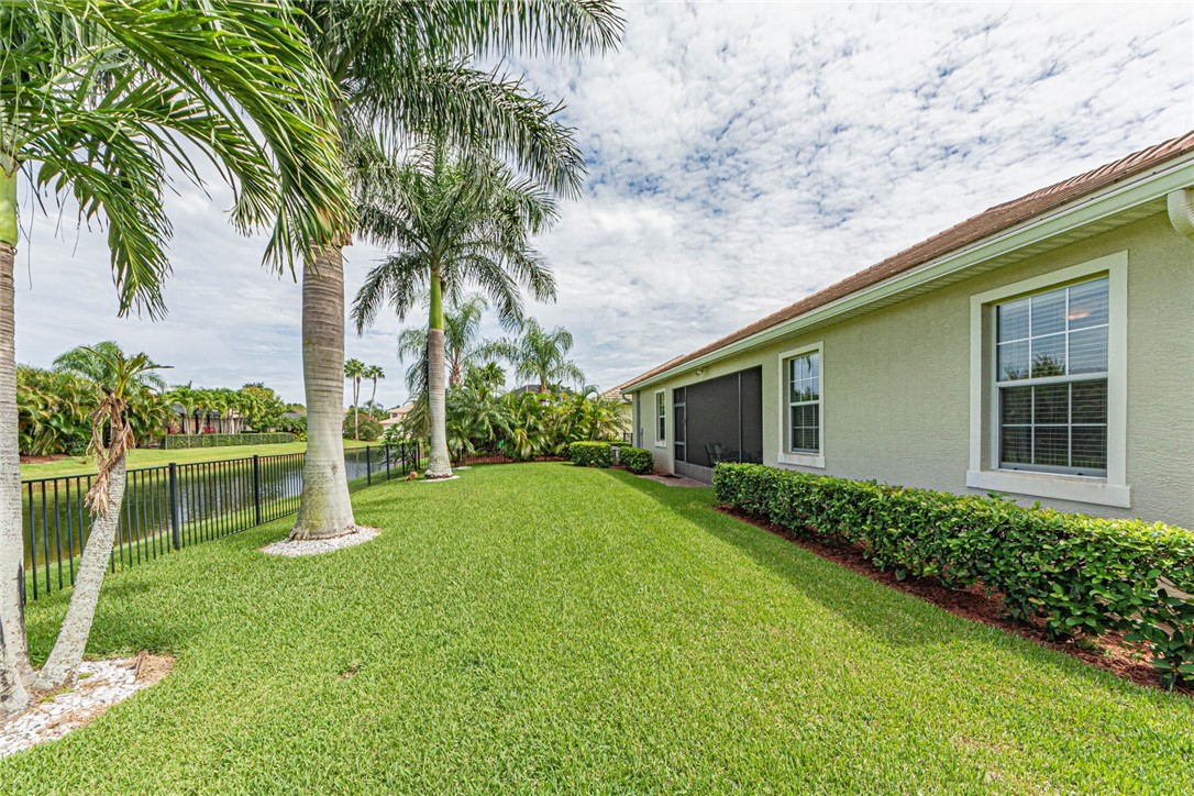 4250 Diamond Square Vero Beach, FL 32967 - Photo 30 of 33 a front view of a house with garden