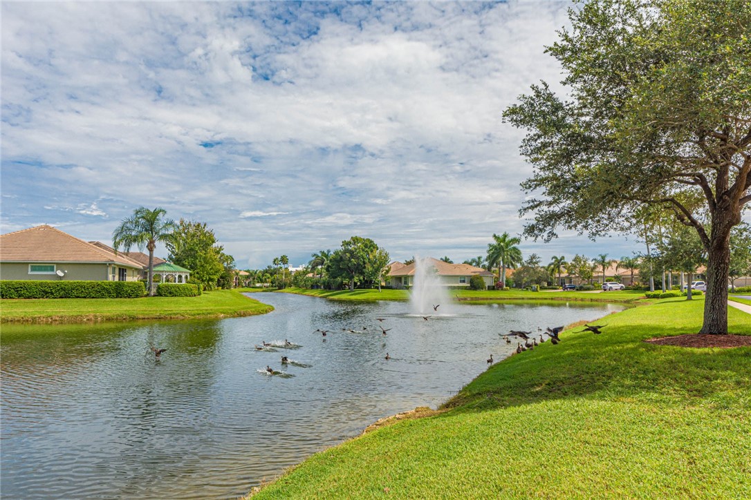 4250 Diamond Square Vero Beach, FL 32967 - Photo 33 of 33 a view of a lake with houses in the back