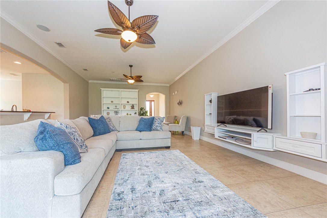 4250 Diamond Square Vero Beach, FL 32967 - Photo 8 of 33 a living room with furniture and a flat screen tv
