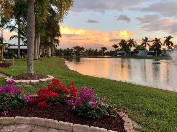 a view of a lake with a garden
