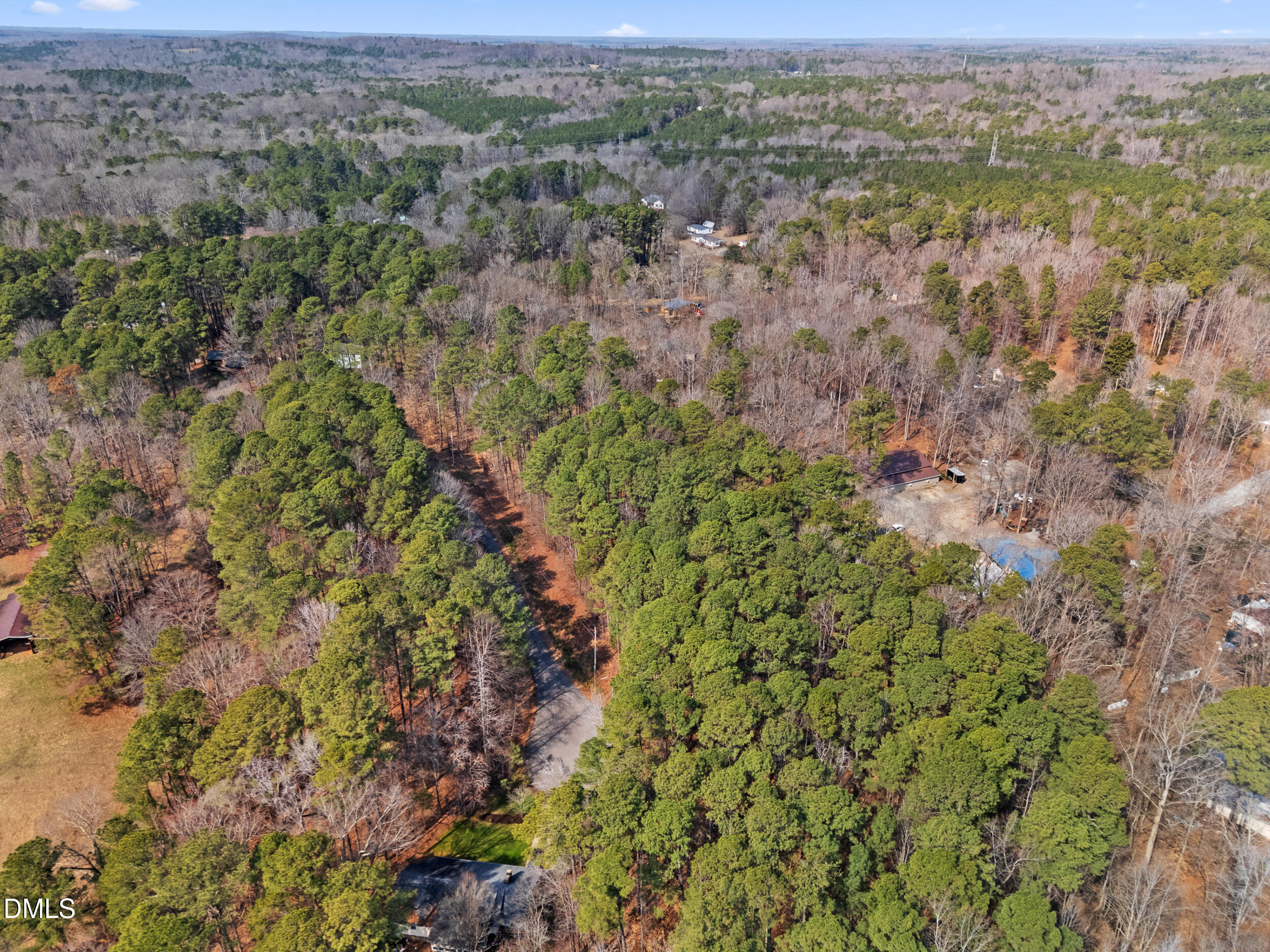 127 Misty Ridge Road Durham, NC 27712 - Photo 3 of 12 an aerial view of residential houses with outdoor space and trees