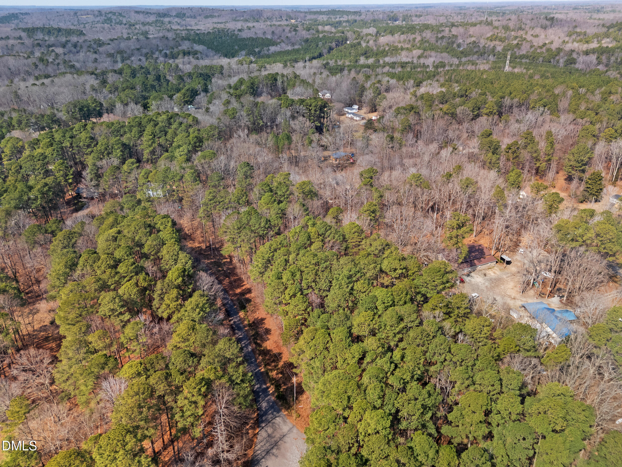 127 Misty Ridge Road Durham, NC 27712 - Photo 6 of 12 a view of a field with trees