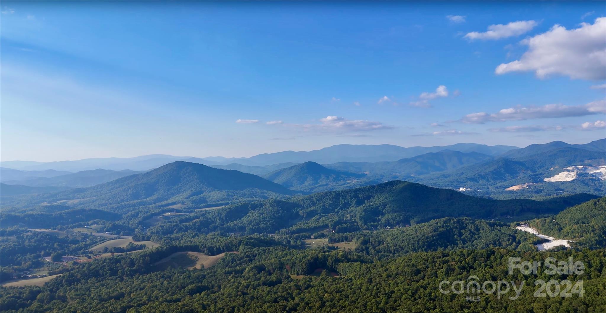 0 Arrowhead Ridge Road Spruce Pine, NC 28777 - Photo 8 of 14 a view of houses with outdoor space
