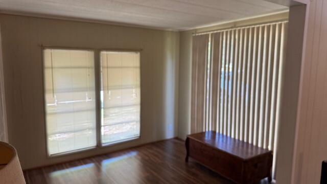 7148 Southeast Seahawk Street Hobe Sound, FL 33455 - Photo 13 of 28 a view of a room with wooden floor and a window