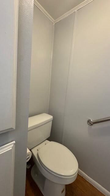 7148 Southeast Seahawk Street Hobe Sound, FL 33455 - Photo 19 of 28 a white toilet sitting next to a shower