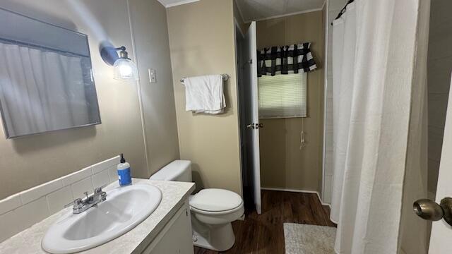 7148 Southeast Seahawk Street Hobe Sound, FL 33455 - Photo 22 of 28 a bathroom with a sink toilet and shower