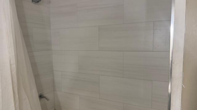 7148 Southeast Seahawk Street Hobe Sound, FL 33455 - Photo 24 of 28 a close up of a shower