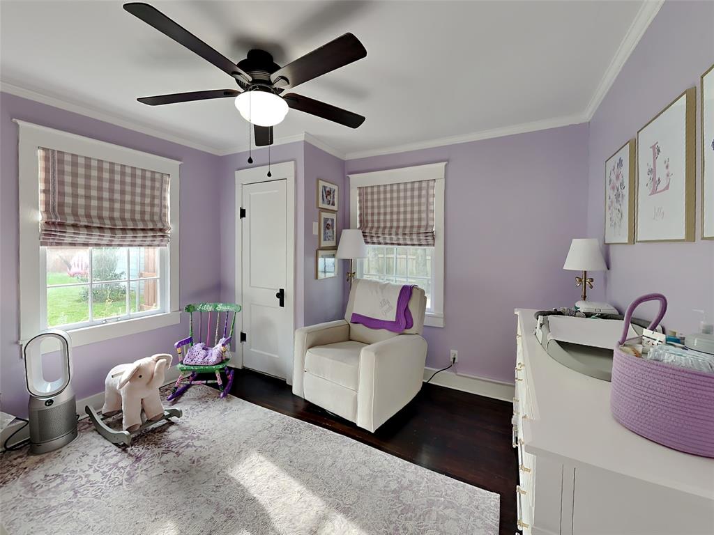 2255 Washington Avenue Fort Worth, TX 76110 - Photo 9 of 12 a living room with furniture and windows