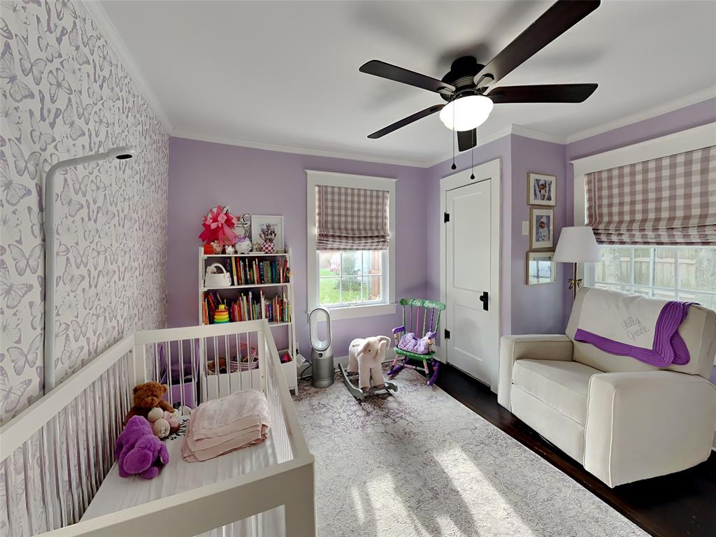 2255 Washington Avenue Fort Worth, TX 76110 - Photo 10 of 12 a bedroom with furniture and a window