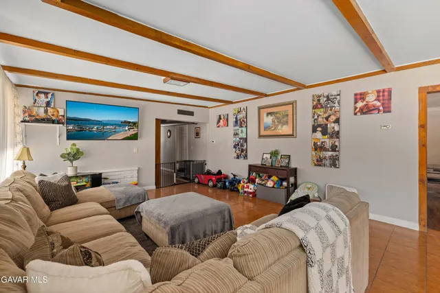 a living room with furniture and a couch