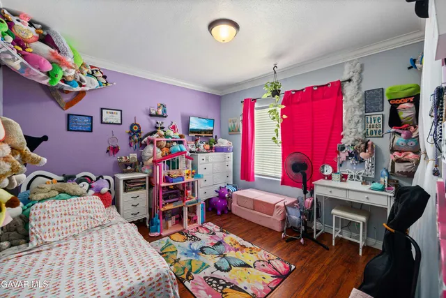 a bedroom with furniture and a bed