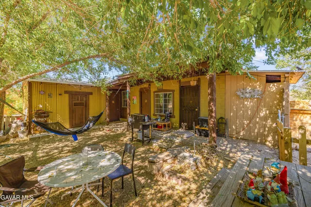a view of house with a outdoor space