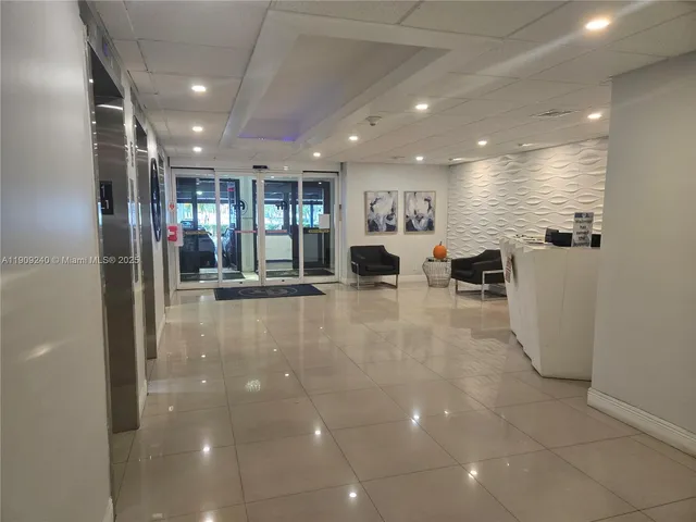 a view of a hallway with elevator