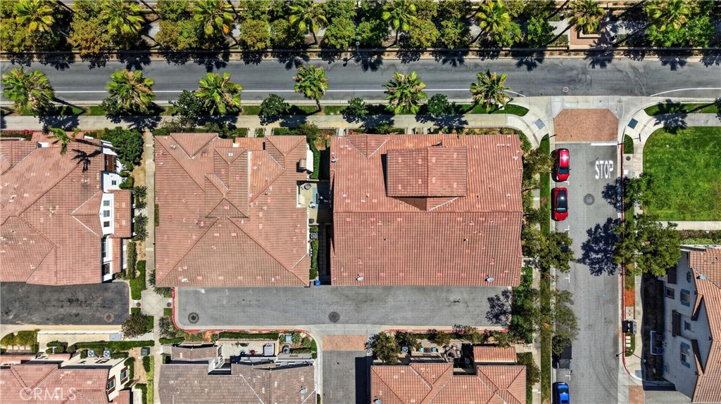 849 The Promenade, Unit D Azusa, CA 91702 - Photo 36 of 37 an aerial view of a house with a yard and lake view