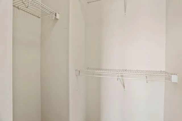 a view of small space with racks on the wall