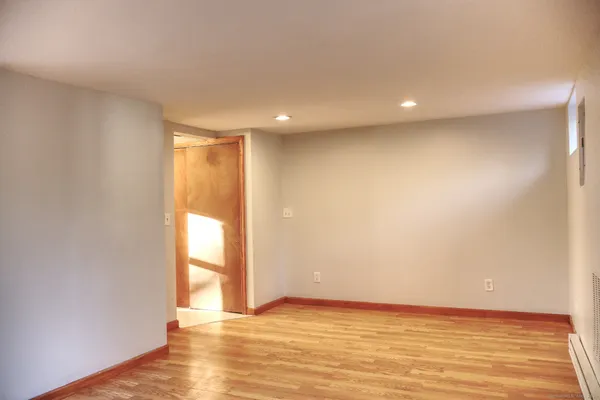 a view of an empty room and window