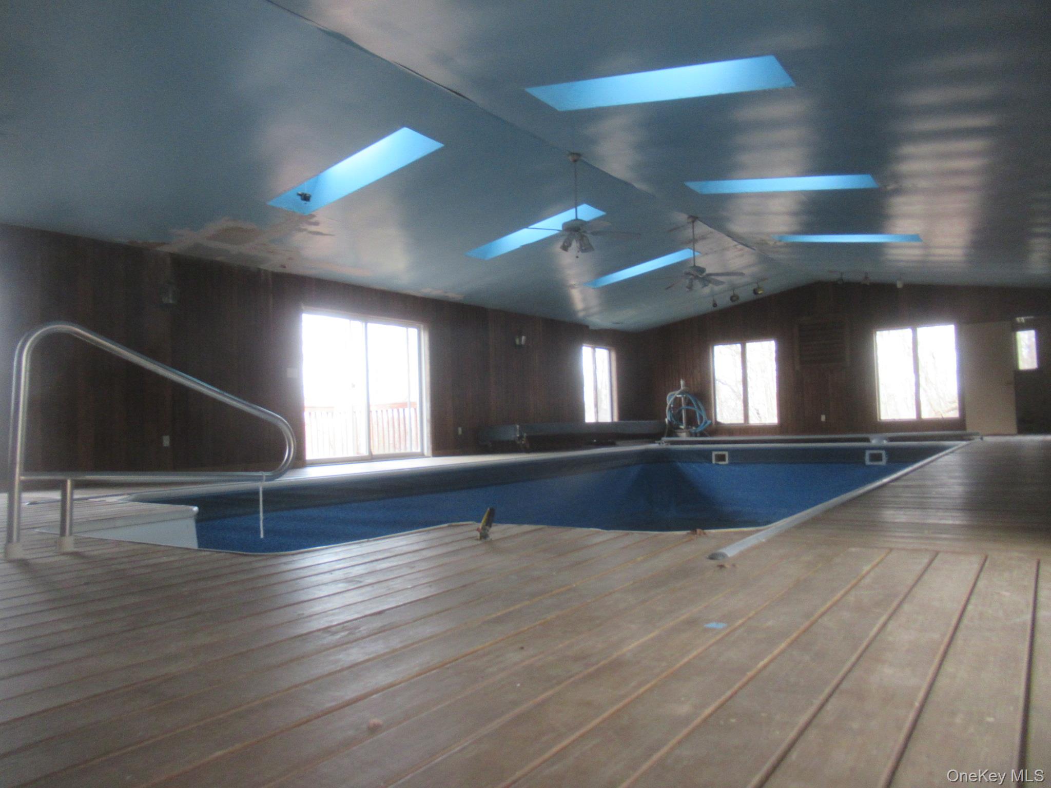 64 Hillside View Road Mahopac, NY 10541 - Photo 3 of 23 View of pool featuring a skylight