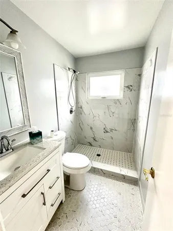 a view of a livingroom with a furniture