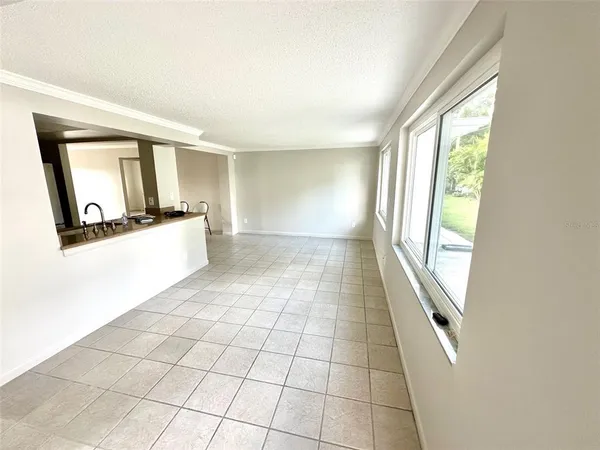 a view of an empty room and window