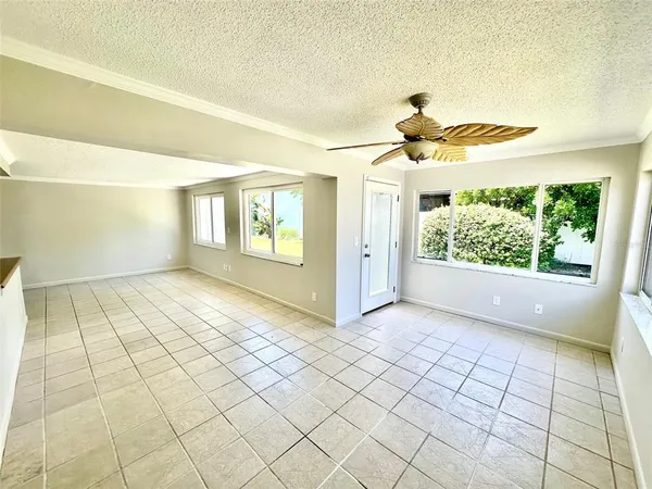 a view of an empty room and window