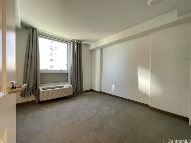 an empty room with a door