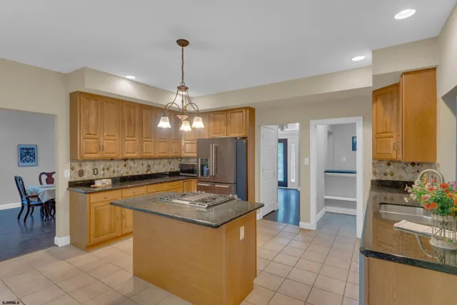a living room with furniture fireplace and window