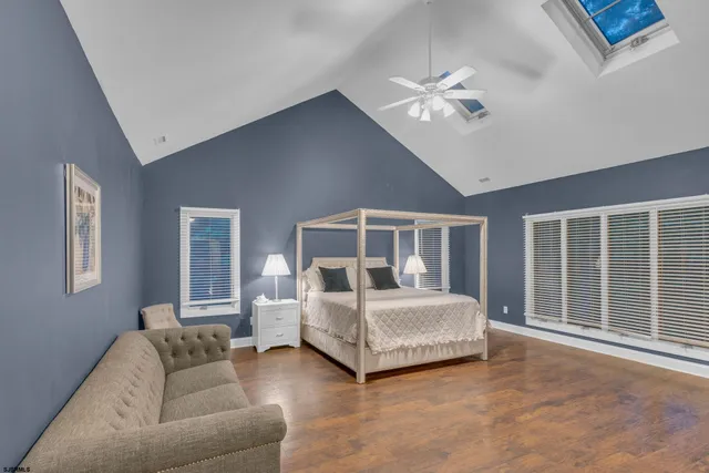 a view of deck with table and chairs and wooden floor