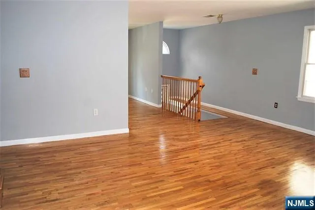 a kitchen with a stove a sink and a refrigerator