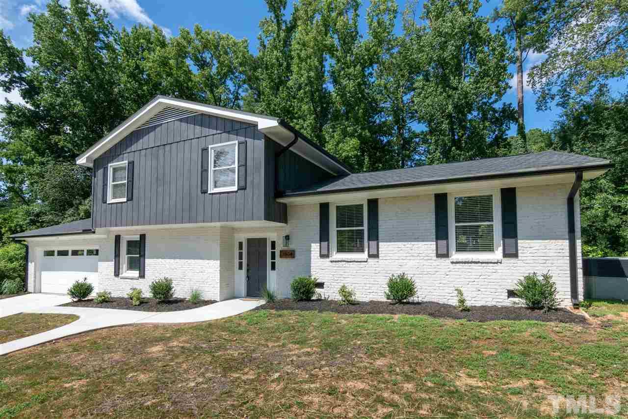 3804 Colgate Place Raleigh, NC 27609 - Photo 2 of 30 a front view of a house with a yard