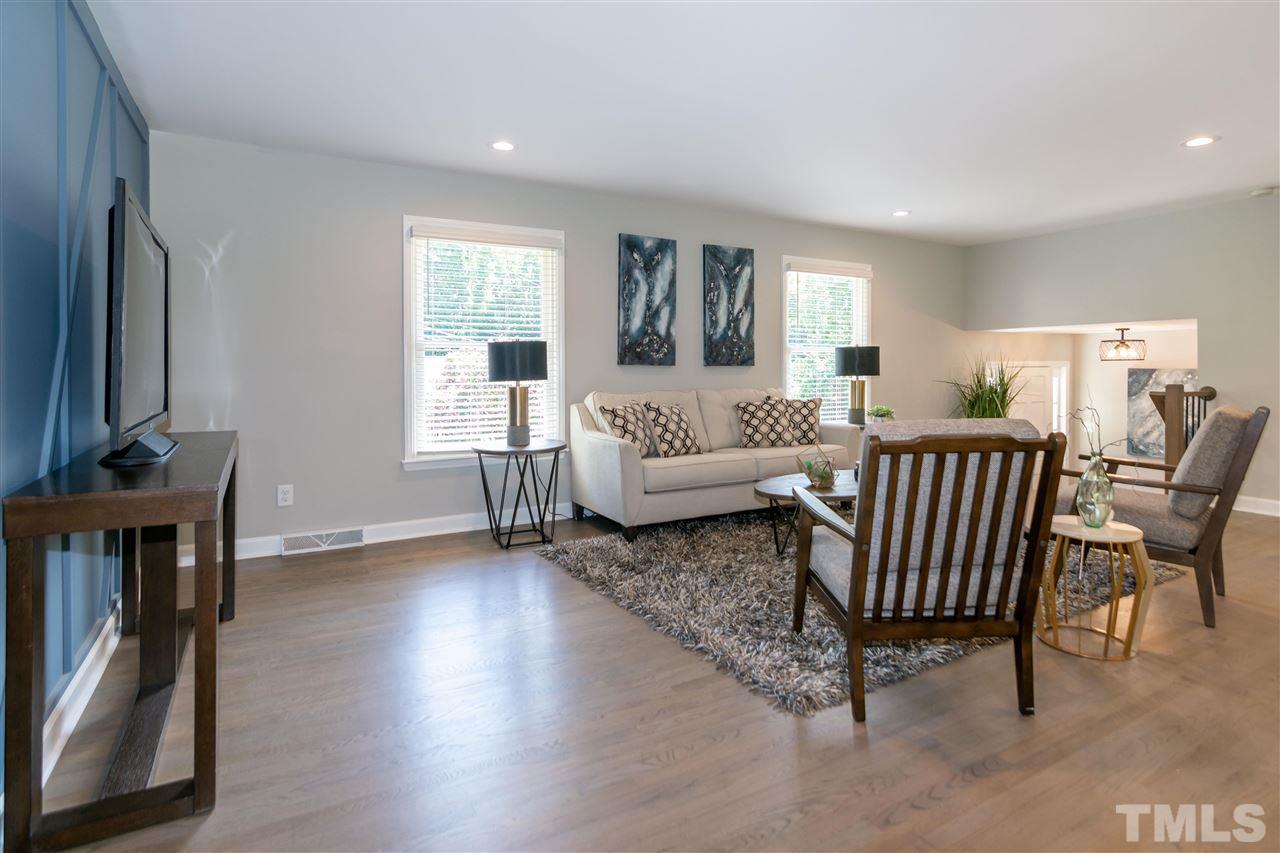 3804 Colgate Place Raleigh, NC 27609 - Photo 12 of 30 a living room with furniture and a window