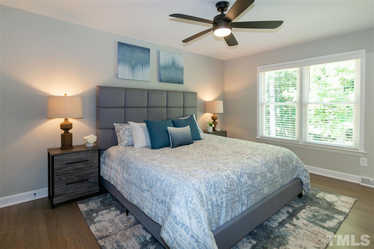 3804 Colgate Place Raleigh, NC 27609 - Photo 19 of 30 a bedroom with a bed and window