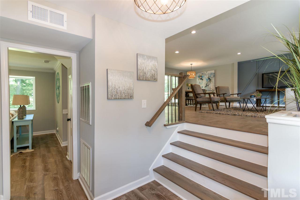 3804 Colgate Place Raleigh, NC 27609 - Photo 27 of 30 a view of entryway and hall with dining room