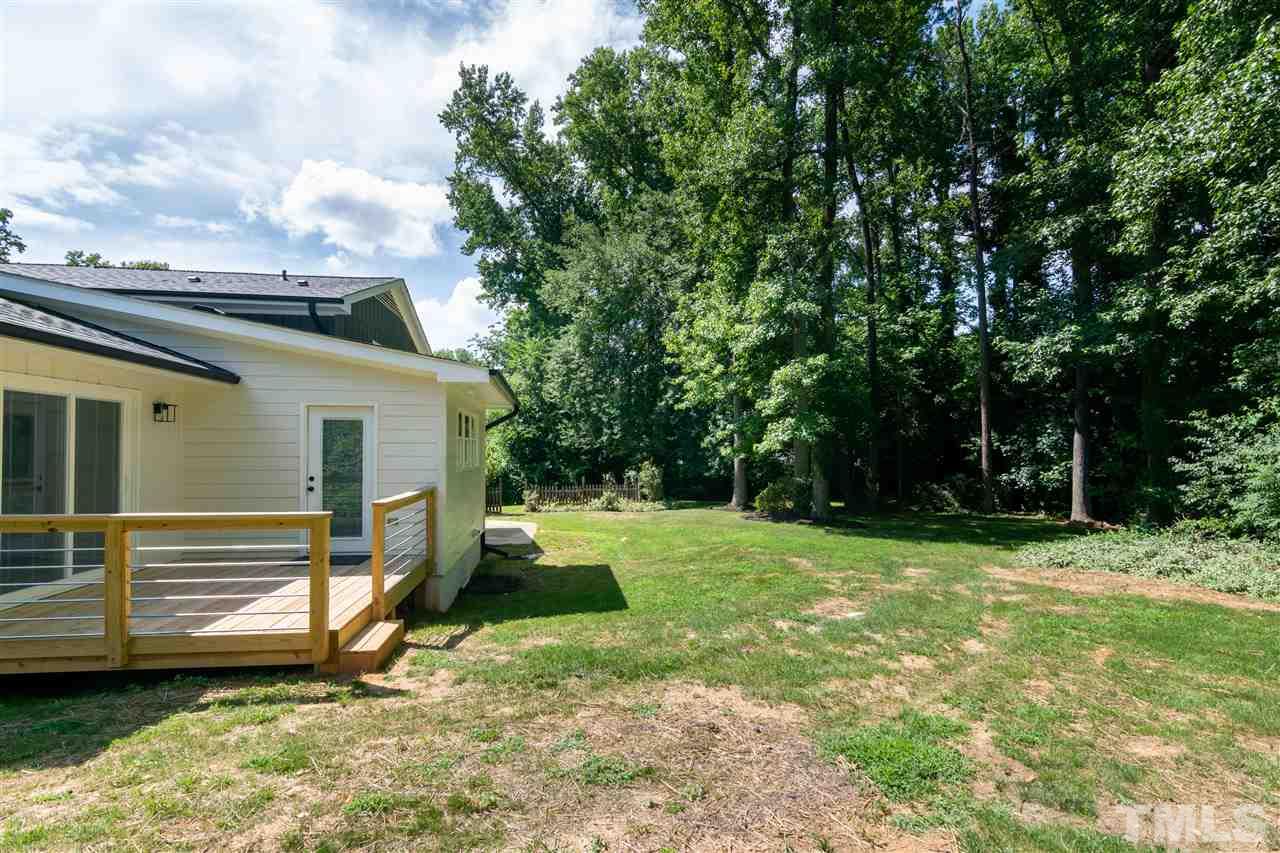 3804 Colgate Place Raleigh, NC 27609 - Photo 28 of 30 a view of a backyard with a garden